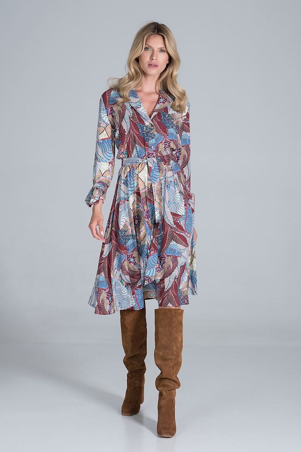 Elegant Midi Dress by Figl with Jacket-Style V-Neck, Flared Hem & Tie Belt, modelled elegantly in a vibrant print and knee-high brown boots, highlighting its luxurious fabric.