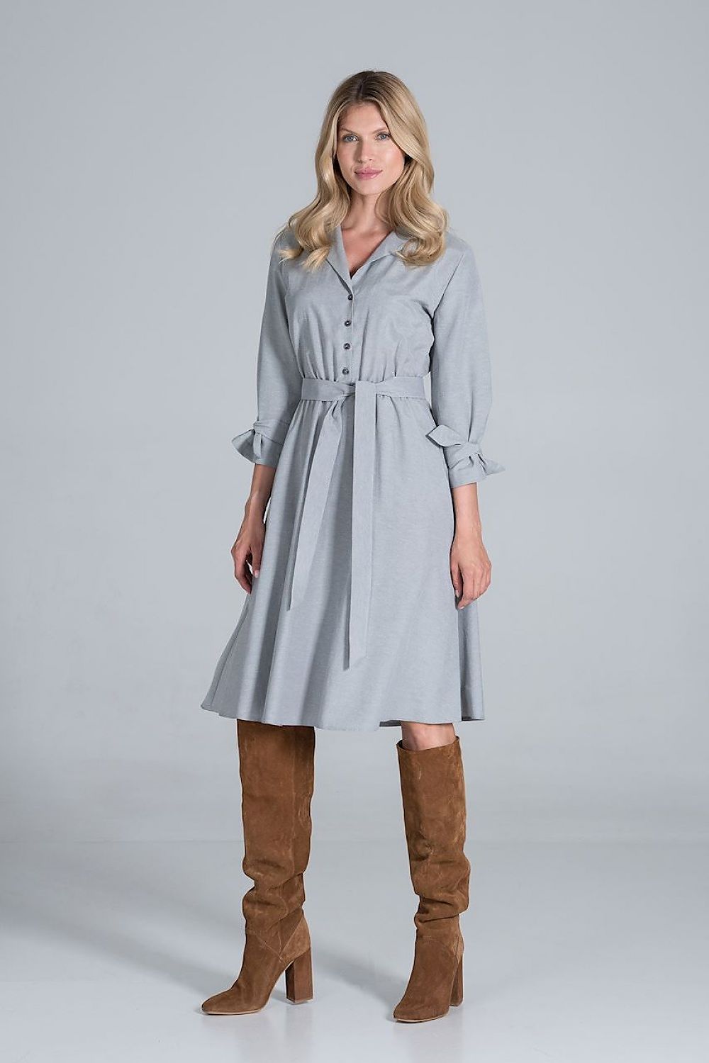 Elegant Midi Dress by Figl with Jacket-Style V-Neck, Flared Hem & Tie Belt, featuring a sophisticated front view in light grey, complemented by a stylish tie belt and paired with chic knee-high boots for a polished look.