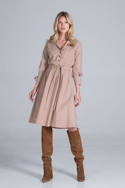 Elegant Midi Dress by Figl featuring a jacket-style v-neck and flared hem, styled with a tie belt and paired with chic knee-high boots.