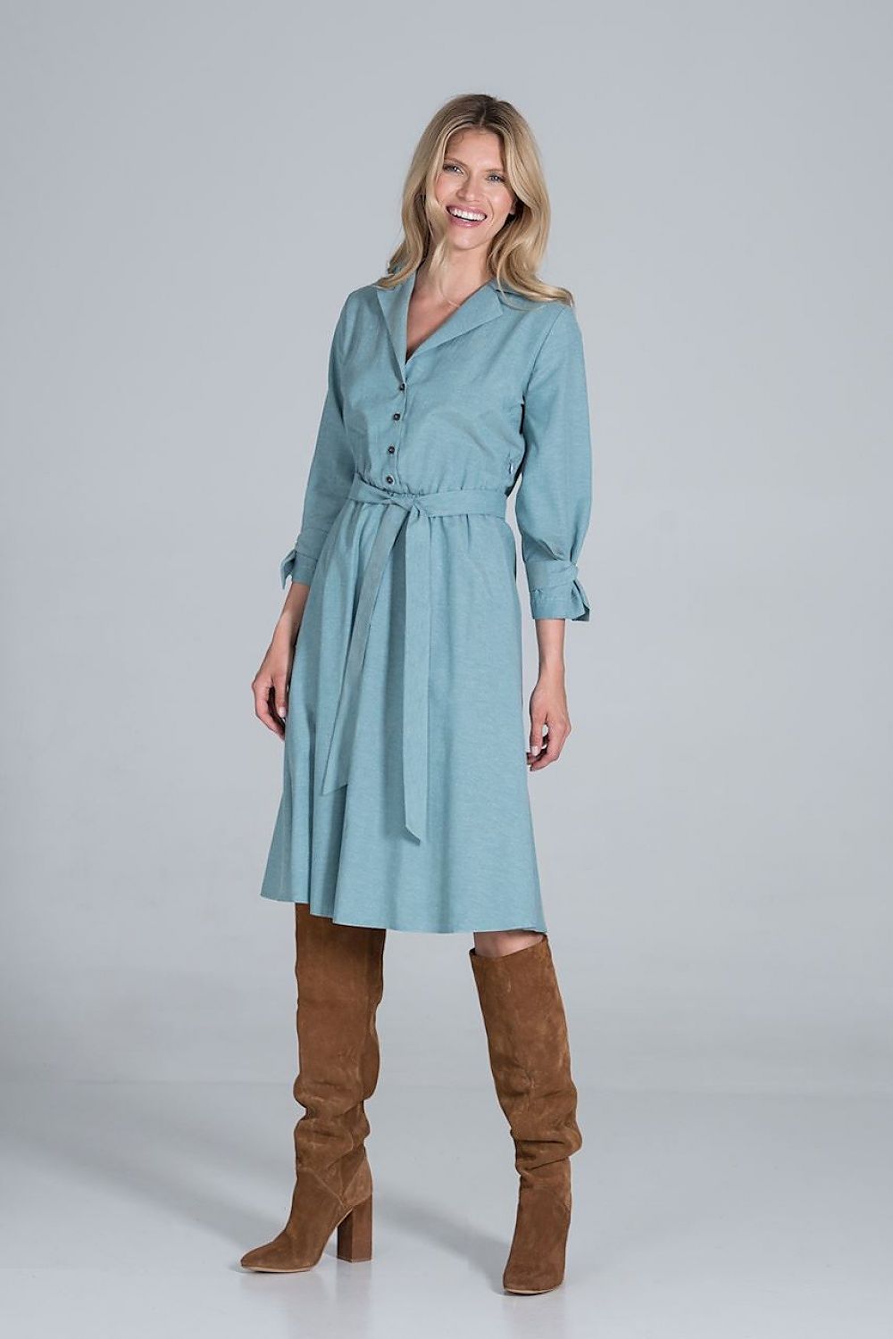 Elegant Midi Dress by Figl with Jacket-Style V-Neck, Flared Hem & Tie Belt, showcased on a model, emphasising its luxurious design and soft blue fabric.