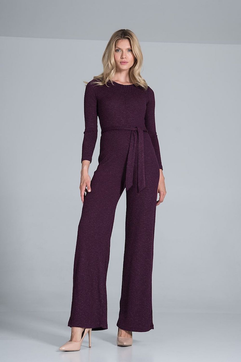 Elegant Figl Wide-Legged Jumpsuit with Back Slit in Flowing Ribbed Knit, showcased in a deep purple colour, featuring long sleeves and a belt, exuding luxury and sophistication.