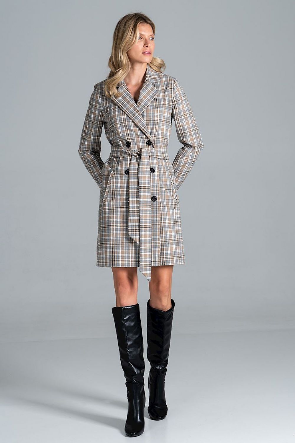 Model posing in the Luxury Figl Knee-Length Autumn Coat with Jacket Collar, 6-Button Closure and Belt, emphasising its chic plaid pattern and sophisticated silhouette.