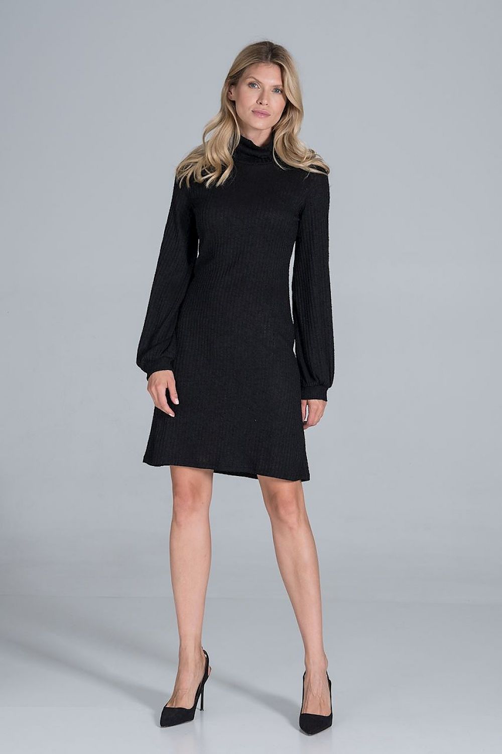 Elegant Turtleneck Midi Dress in Flowing Ribbed Knit by Figl, highlighting the luxurious fabric and design, presented in an elegant setting with stylish black heels.