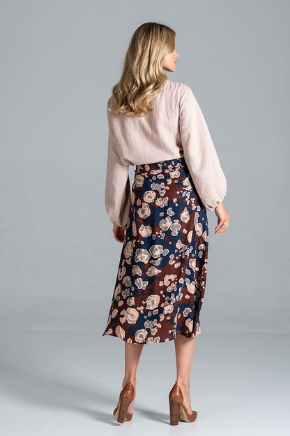 Back view of the sophisticated Figl Trapeze Midi Skirt With Front Buttons combined with a light pink blouse, highlighting the exquisite floral print, ideal for upscale events.