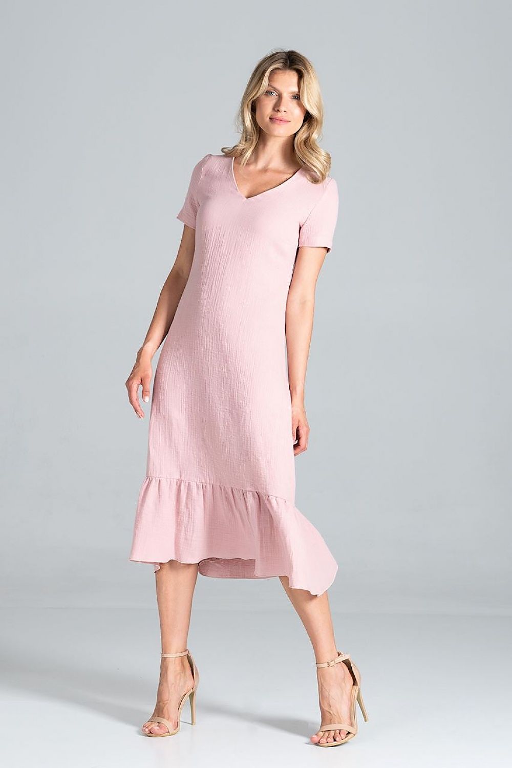 Front view of the Elegant Midi Dress with Sweetheart Neckline and Flouncy Hem by Figl in a delicate pink hue, highlighting the feminine design and flouncy hem for a stylish look.