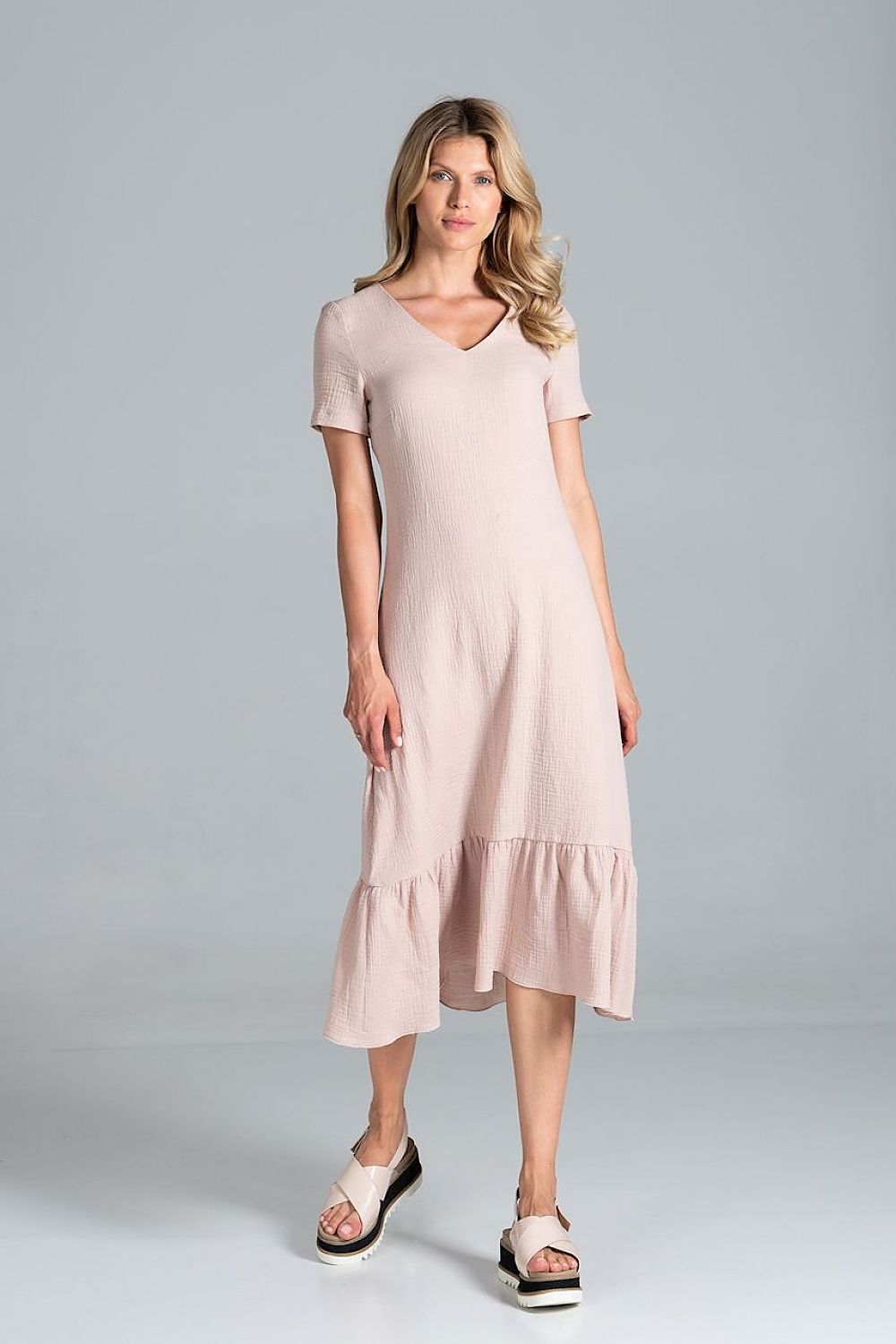 Elegant Midi Dress with Sweetheart Neckline and Flouncy Hem by Figl - 100% Viscose presented by a model in a front view.