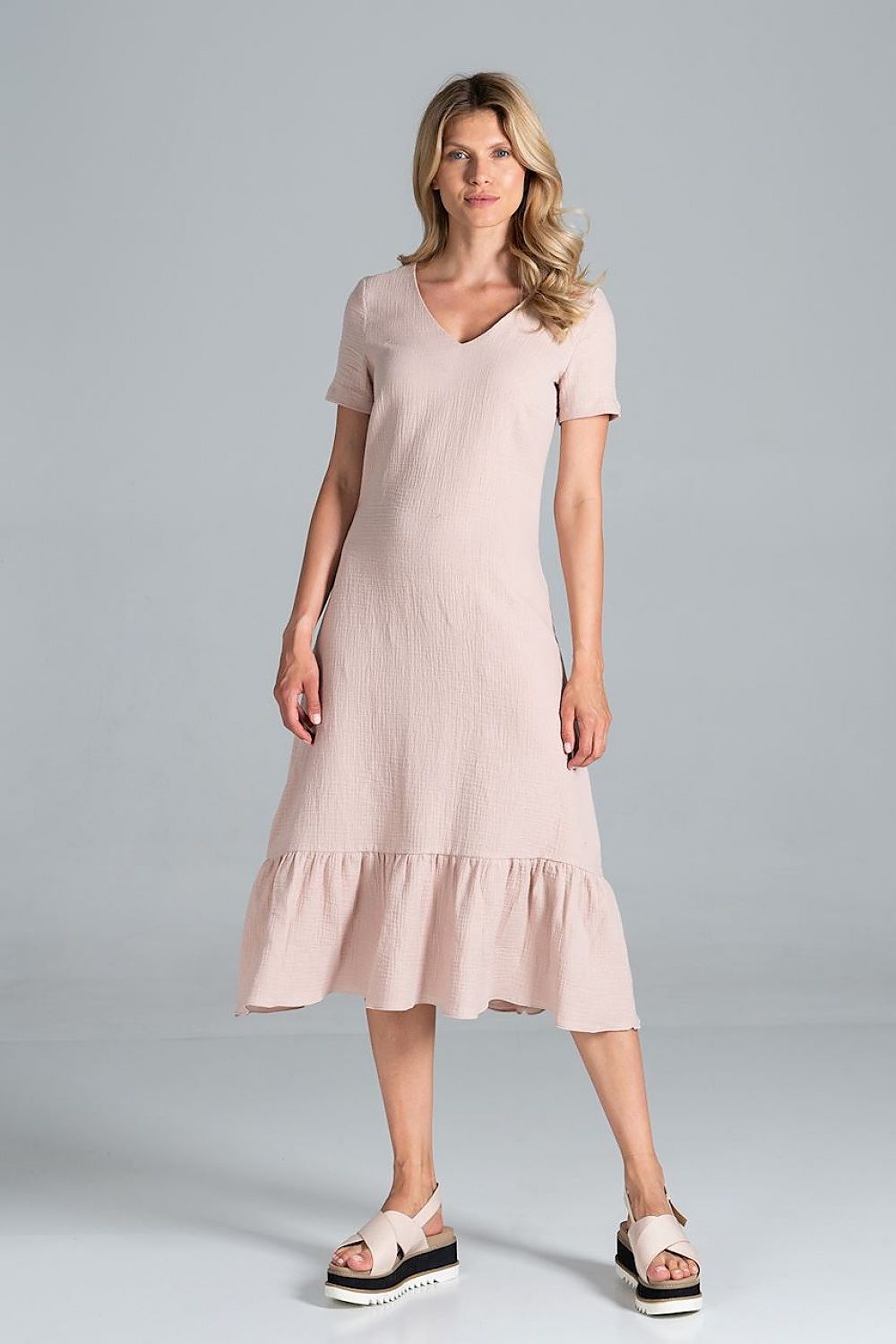 Elegant Midi Dress with Sweetheart Neckline and Flouncy Hem by Figl - 100% Viscose model displaying the dress's flattering fit from another angle.