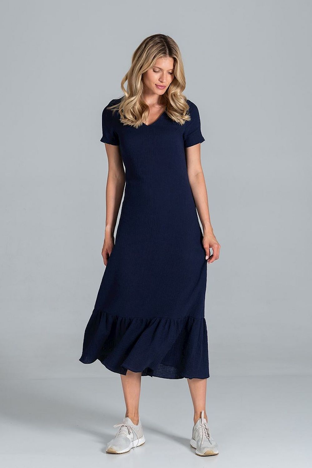 Elegant Midi Dress with Sweetheart Neckline and Flouncy Hem by Figl showcased on a model, featuring a navy colour, short sleeves, and a flouncy hem for a luxurious look.