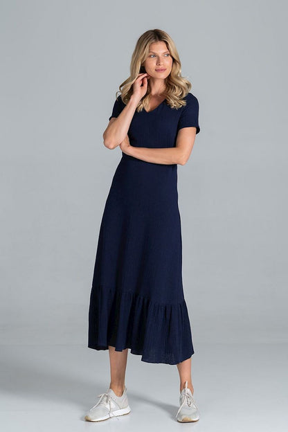 Elegant Midi Dress with Sweetheart Neckline and Flouncy Hem by Figl displayed on a model in navy, demonstrating its sophisticated design with a flouncy hem and sweetheart neckline.