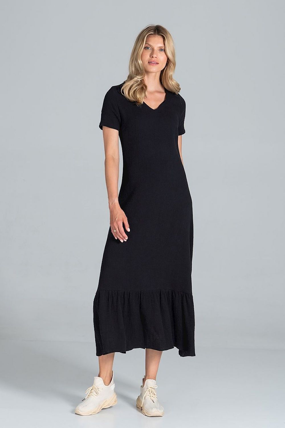 Elegant Midi Dress with Sweetheart Neckline and Flouncy Hem by Figl displayed in a model wearing a chic black midi dress featuring a flouncy hemline and a flattering sweetheart neckline, perfect for sophisticated occasions.