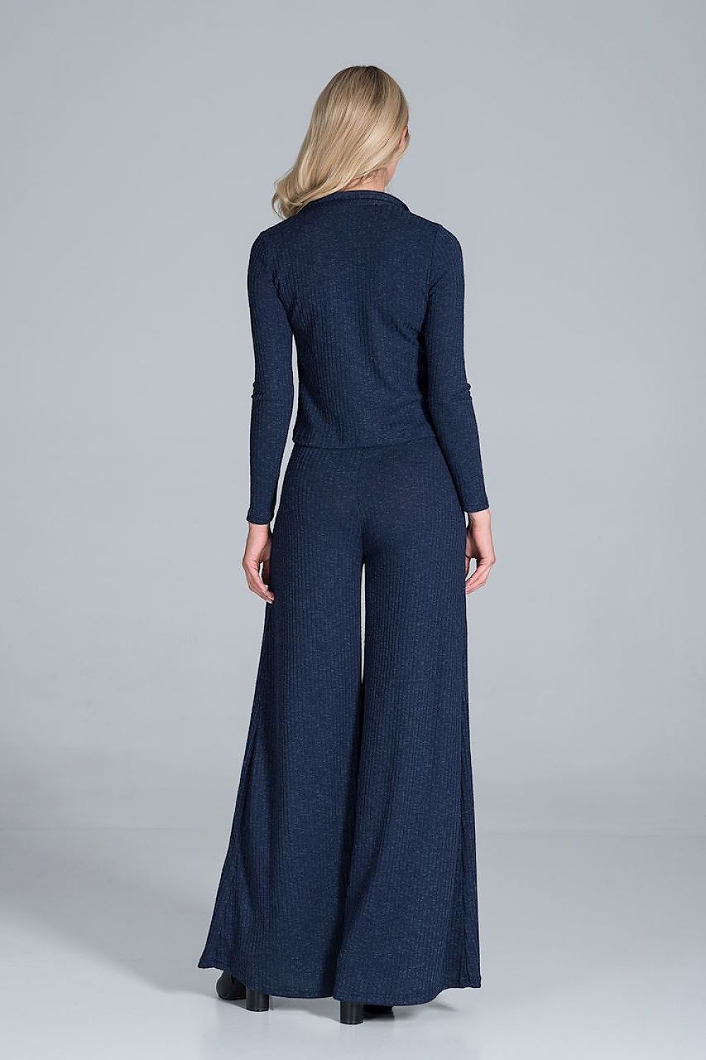 Figl Women's Luxury Ribbed Knit Blouse With Collar and Front Zip Fastening, Long Sleeves, model's back view in navy outfit.
