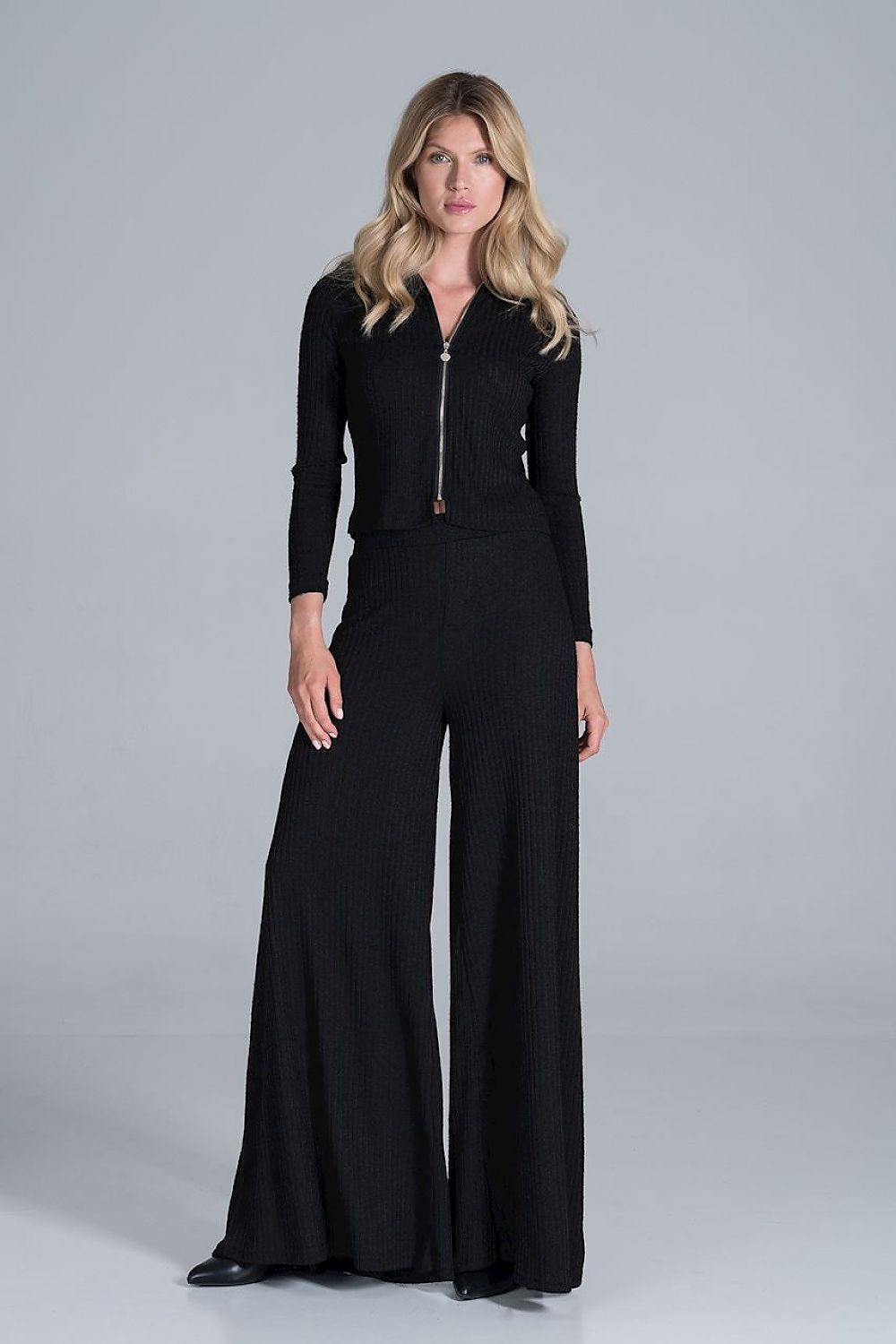 Figl Women's Luxury Ribbed Knit Blouse With Collar and Front Zip Fastening, Long Sleeves, elegantly styled with wide-legged trousers, showcased in a sophisticated black hue.