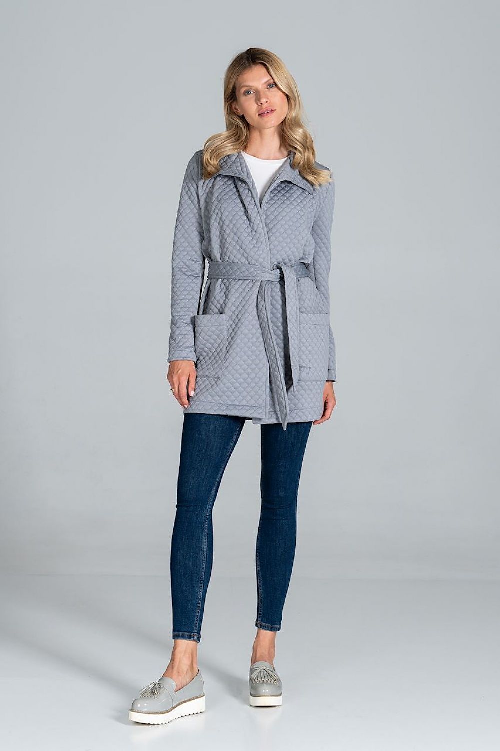 Elegant front view of the Figl Short Quilted Coat With Belt And Collar, highlighting its stylish tie belt and practical patch pockets, perfect for a luxury outfit.