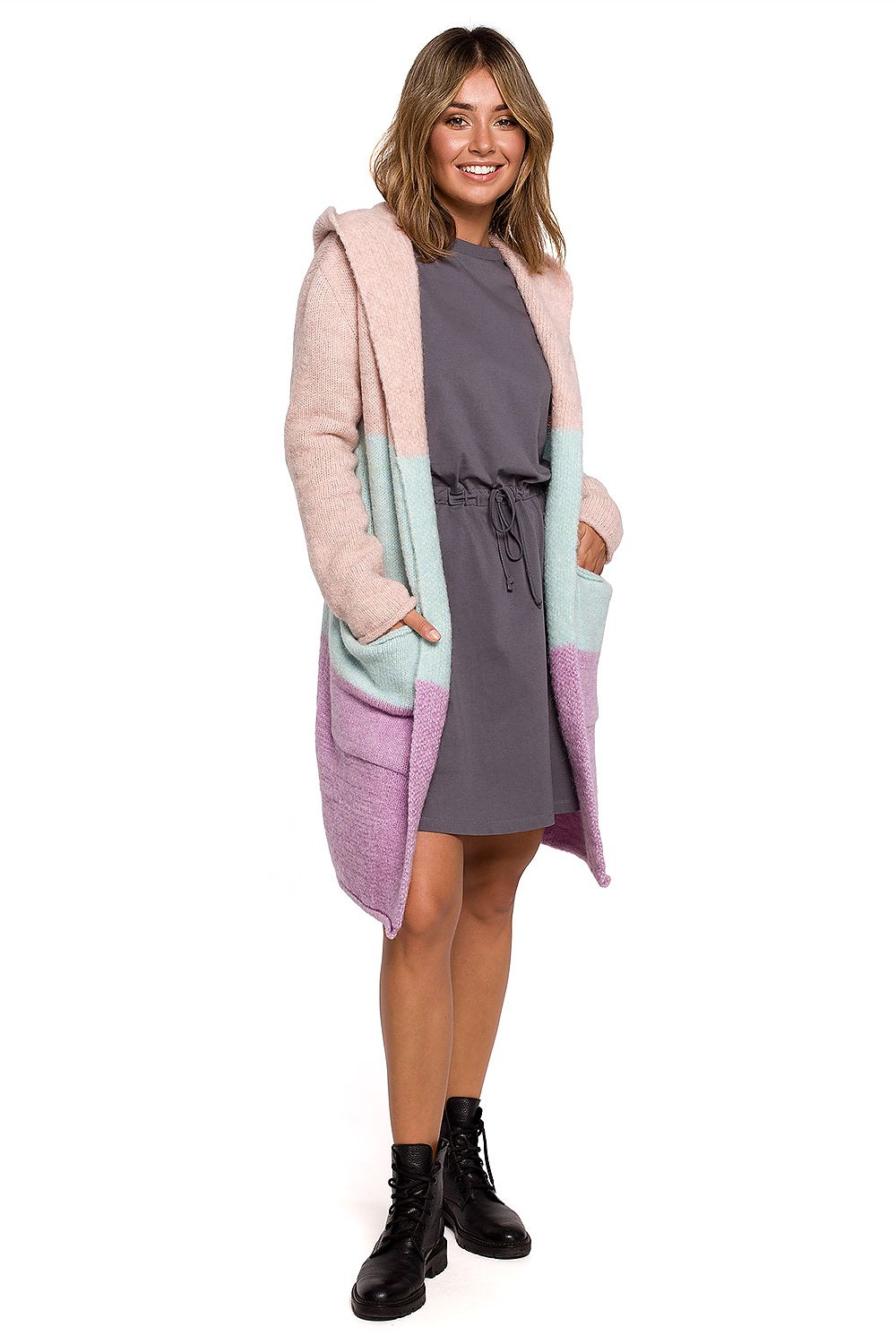 Luxurious Hooded Cardigan by BE Knit - Model showcases the stylish unbuttoned design in a pink, mint, and purple colour blend, perfect for a chic winter look.