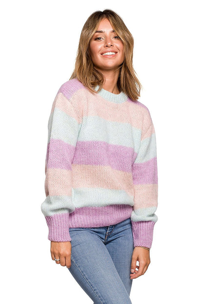 Luxurious BE Knit Jumper in soft pastel stripes, styled with relaxed denim, exuding charm and comfort for autumn and winter.