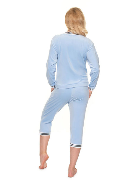 Back view of the Luxury PeeKaBoo Velour Tracksuit Set with Contrasting Piping - 3/4 Length Trousers, highlighting the soft blue velour material and elegant design.