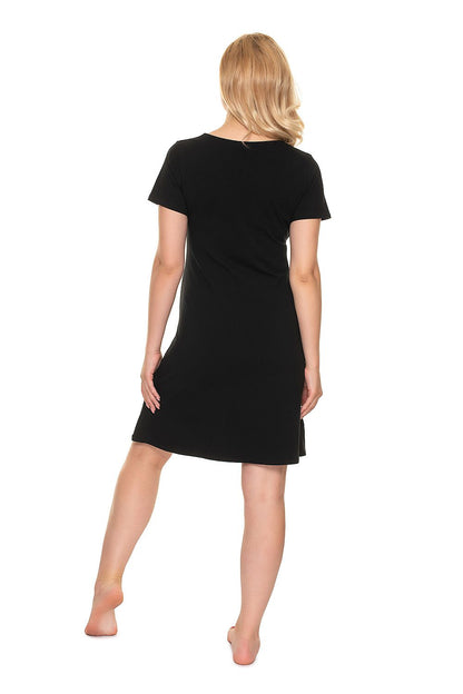 Back view of a pregnant model in the Luxury Maternity Nightshirt by PeeKaBoo, demonstrating the sleek, elegant cut of the garment.