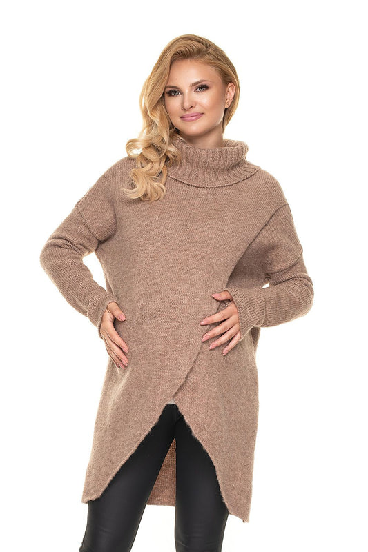 Luxurious Wool Blend Pregnancy Sweater with Turtleneck - PeeKaBoo Asymmetrical Design, featuring a stylish model cradling her baby bump, showcasing the soft and fluffy fabric in a elegant neutral tone.