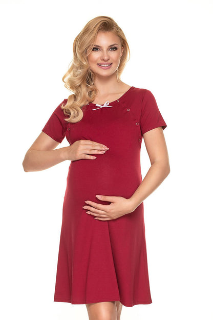 Elegant Maternity Nightgown with Bow, Ideal for Breastfeeding - PeeKaBoo Luxury Nightshirt model smiles while showcasing the red nightgown, perfectly designed for breastfeeding and maternity wear.