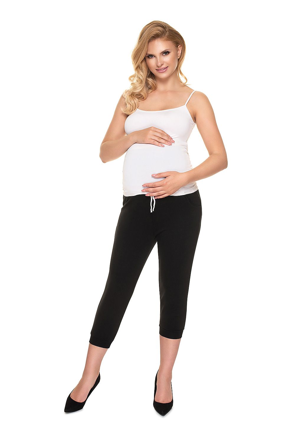 Stylish model wearing Ribbed Cotton Maternity Crop Pants with Side Pockets by PeeKaBoo, highlighting the elegant fit and flattering design for expectant mothers.