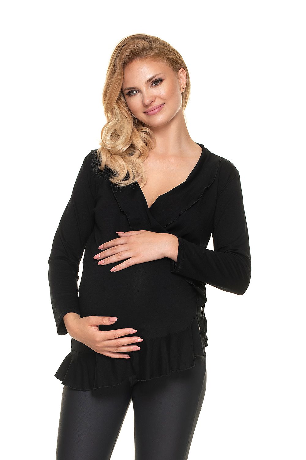 Elegantly styled maternity blouse with frills, showcasing adjustable size for pregnancy wear. Model exudes confidence while gently cradling her baby bump, embodying luxury and comfort, designed by PeeKaBoo.