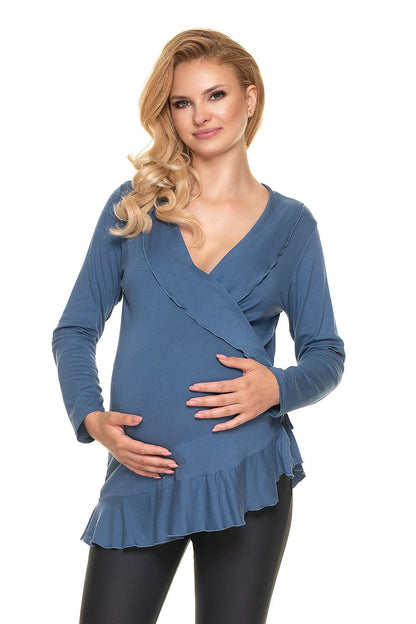 Graceful front view of a pregnant model wearing the Stylish Maternity Blouse With Frills - Adjustable Size Pregnancy Wear by PeeKaBoo, in an attractive blue hue, highlighting its versatile and luxurious design.