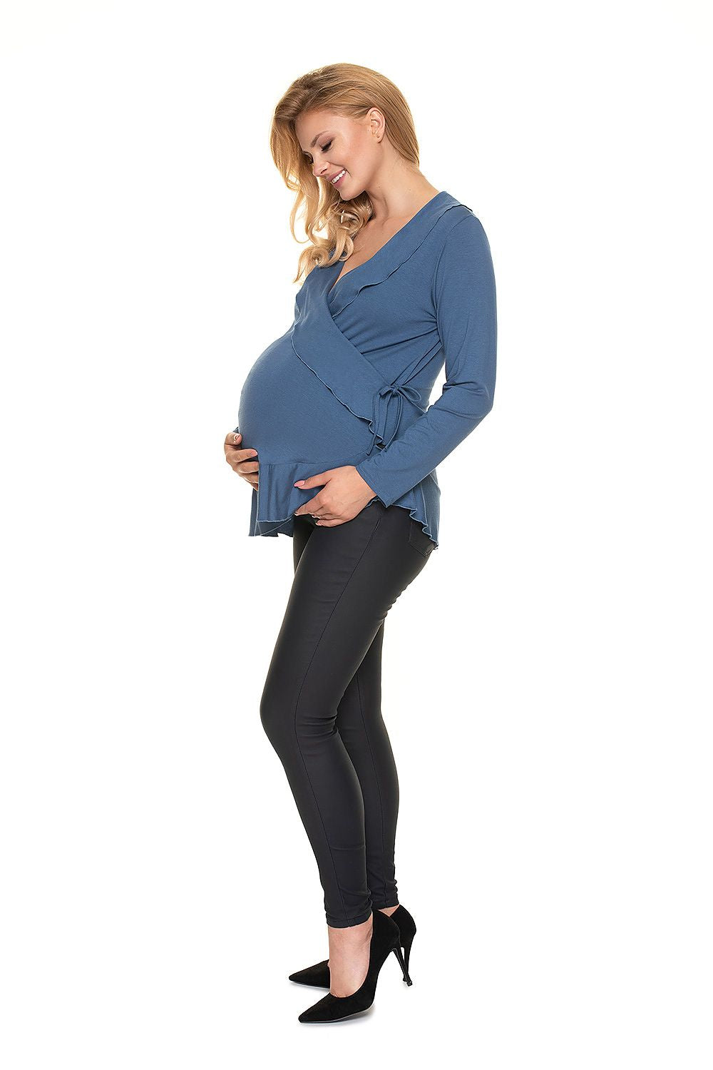 Stylish Maternity Blouse With Frills - Adjustable Size Pregnancy Wear by PeeKaBoo; a side view image of a pregnant woman gracefully showcasing the blouse, emphasizing its elegant frill design and adjustable fit, ideal for pregnancy and beyond.