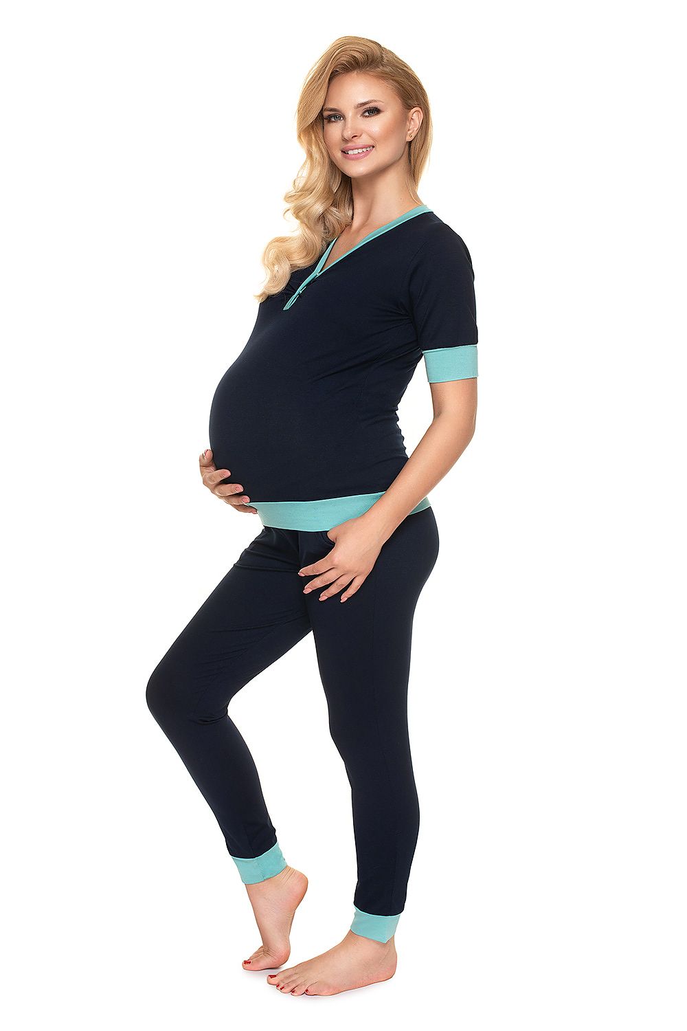Luxury Maternity & Nursing Pajamas with Fasteners for Effortless Breastfeeding - PeeKaBoo, showcasing a stunning pregnant model in a dark blue pajama set, highlighting its practicality and sophisticated look.