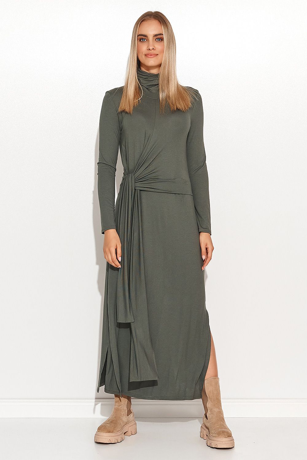 Makadamia elegant long turtleneck daydress in lightweight viscose knit, featuring an asymmetrical tie and slits, perfect for sophisticated occasions. Available in sizes EU 36-42.