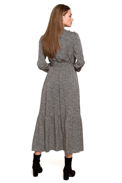 Rear view of the Elegance Meets Comfort: Leopard Print Maxi Dress with Ruffle and Stand-Up Collar by Stylove, highlighting the beautifully tiered design and belt detail, perfect for a chic and comfortable outfit.