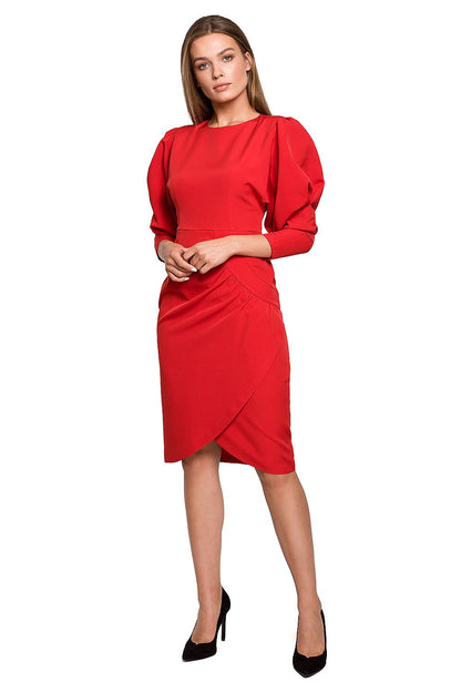 Stylove Elegant Daydress with Buffet Sleeves and Concealed Zip Fastening in a striking red shade, showcased by a model wearing chic high heels, ideal for making an impression at any occasion.