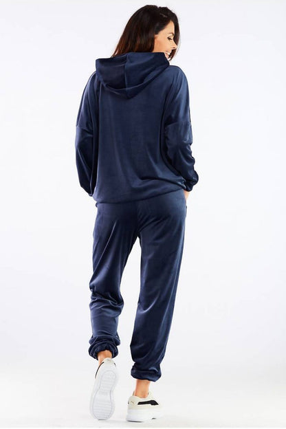 Luxury Awama Velour Tracksuit Trousers - Loose Fit, Made in Poland, showcasing stylish back view with a comfortable hooded top and tapered trousers.