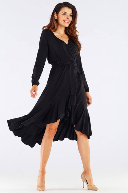 Elegant Awama Ladies Cocktail Dress with Envelope Neckline and Frill Detail in Natural Viscose. A stylish model showcases the dress with flowing frills and a sophisticated silhouette, perfect for special occasions.