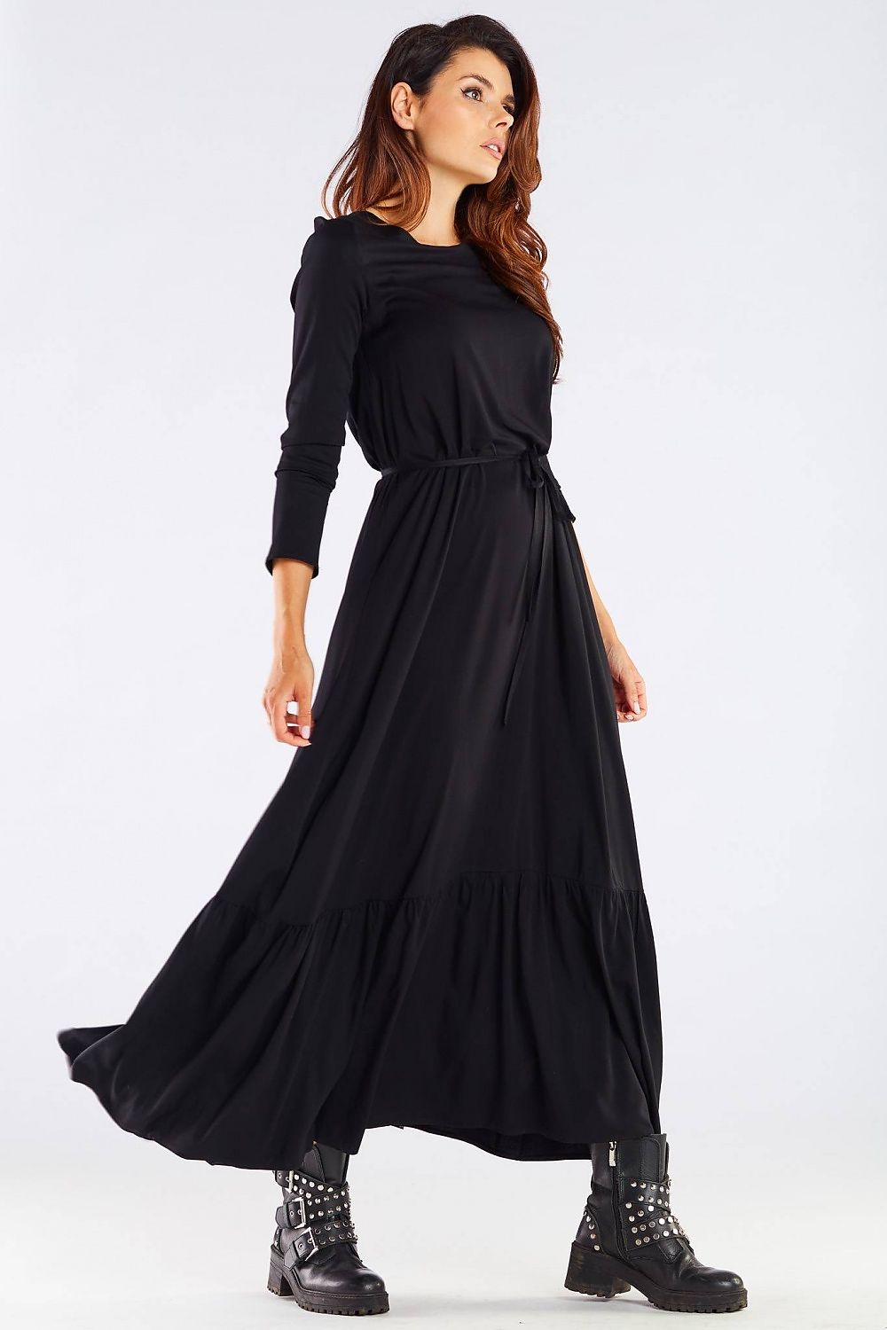 Model gracefully wearing the Luxurious Viscose Kimono Cut Day Dress with Frill and Belt by Awama in black, accentuating the dress's long, elegant silhouette.