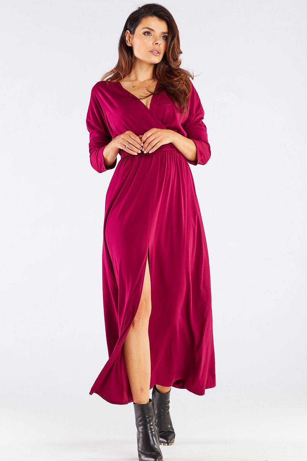 Detailed view of the Elegant Long Sleeve Daydress in Viscose with Zip Detail - Perfect for Colder Days, featuring a zip front and flowing fabric, model wearing magenta.