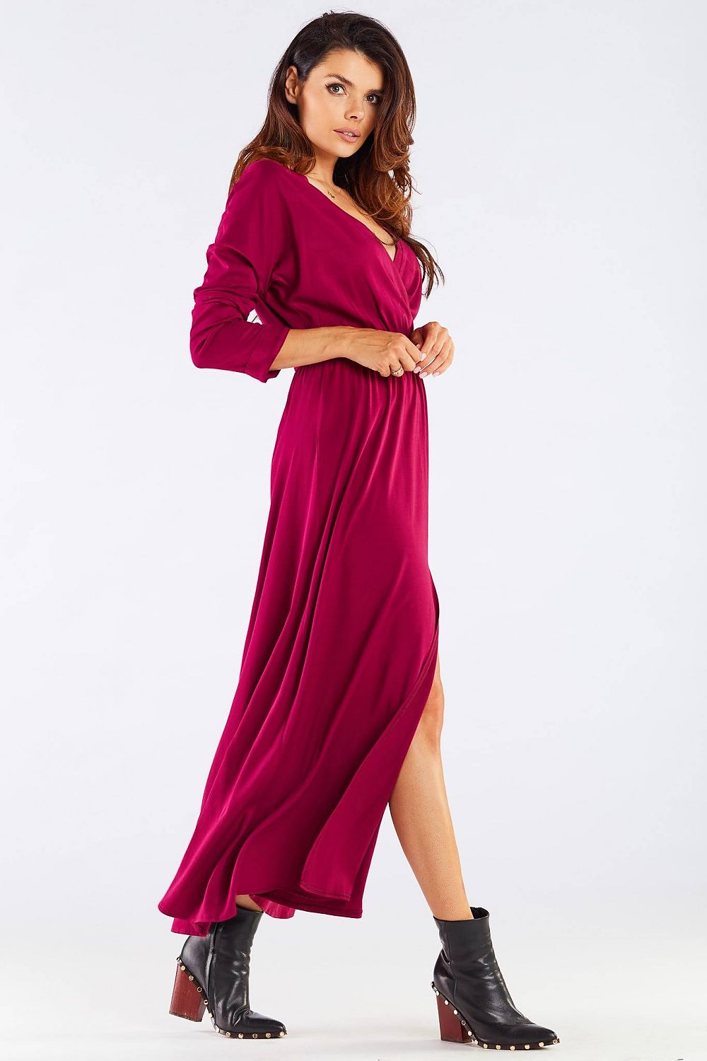 Elegant Long Sleeve Daydress in Viscose with Zip Detail - Perfect for Colder Days, presented with a front view of the model in a burgundy dress styled elegantly with a thigh slit, demonstrating its luxurious design.