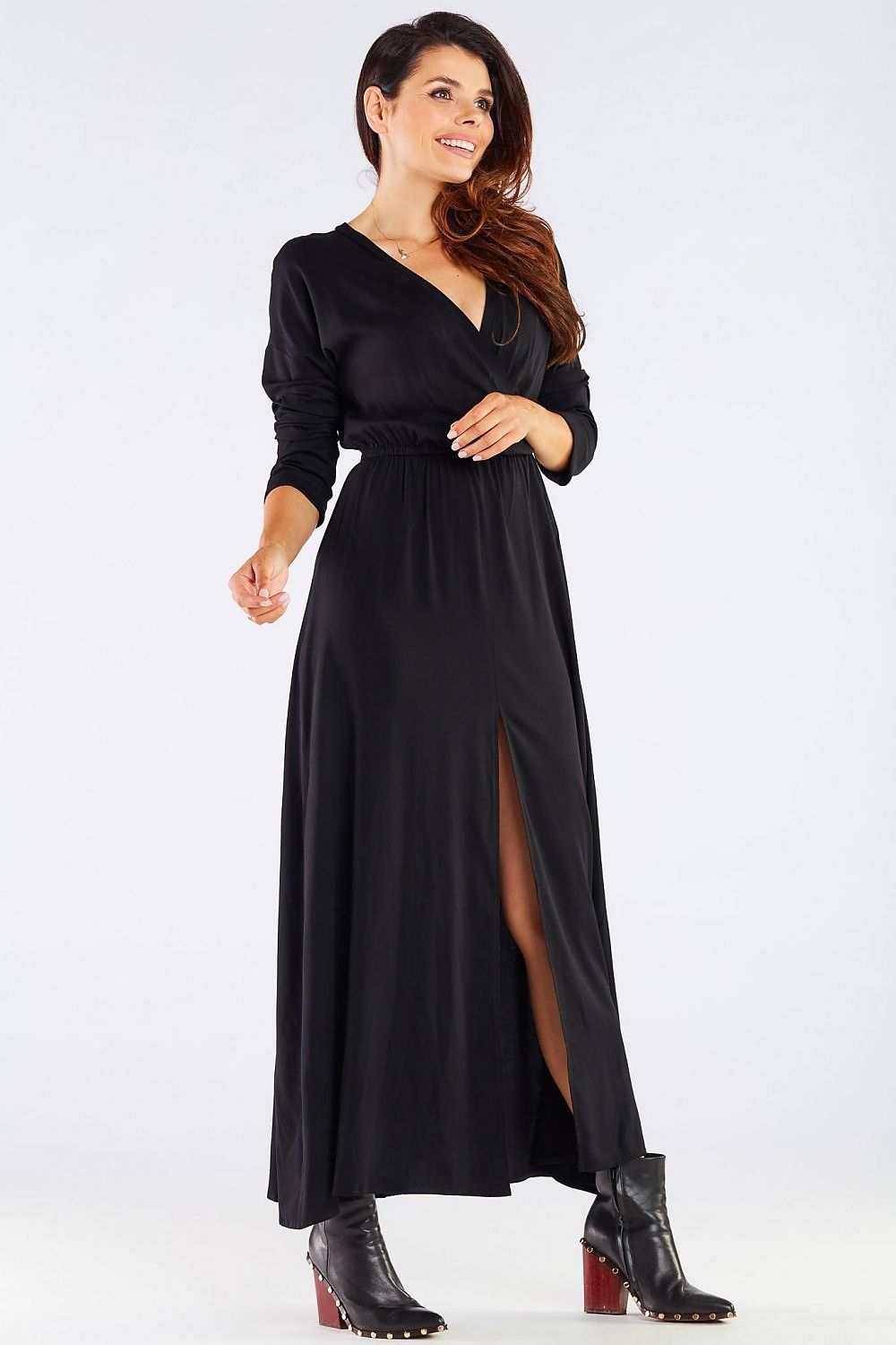 Elegant Long Sleeve Daydress in Viscose with Zip Detail, featuring a sleek silhouette and front slit designed for colder days, styled with chic black ankle boots.