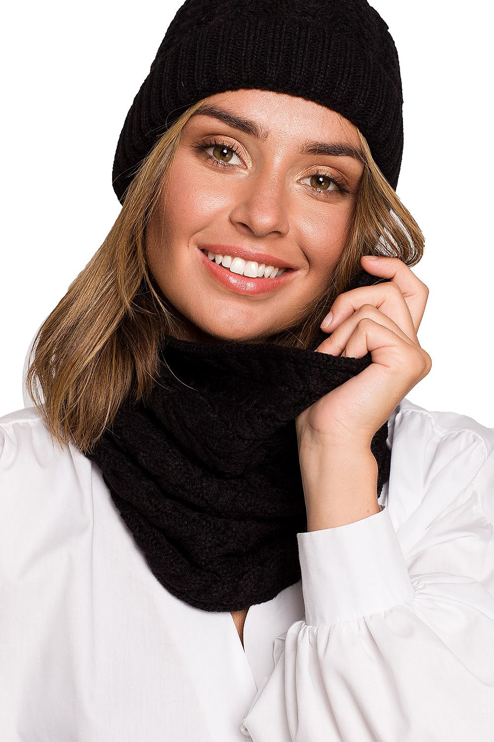 Luxury Thick Plaid Knit Infinity Scarf for Autumn and Winter by BE Knit, highlighted on a model with a bright smile, exuding warmth and luxury in a cozy black ensemble.