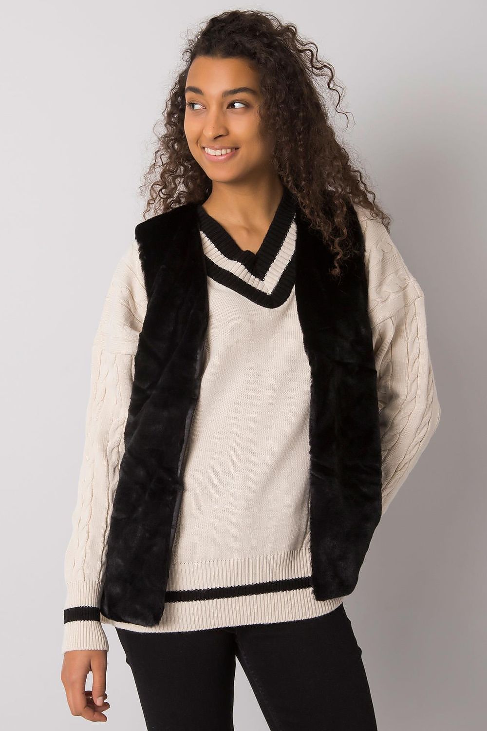 Versatile luxurious animal print gilet vest by Yups, perfect for both casual and upscale occasions, featuring a tailored mid-length design.