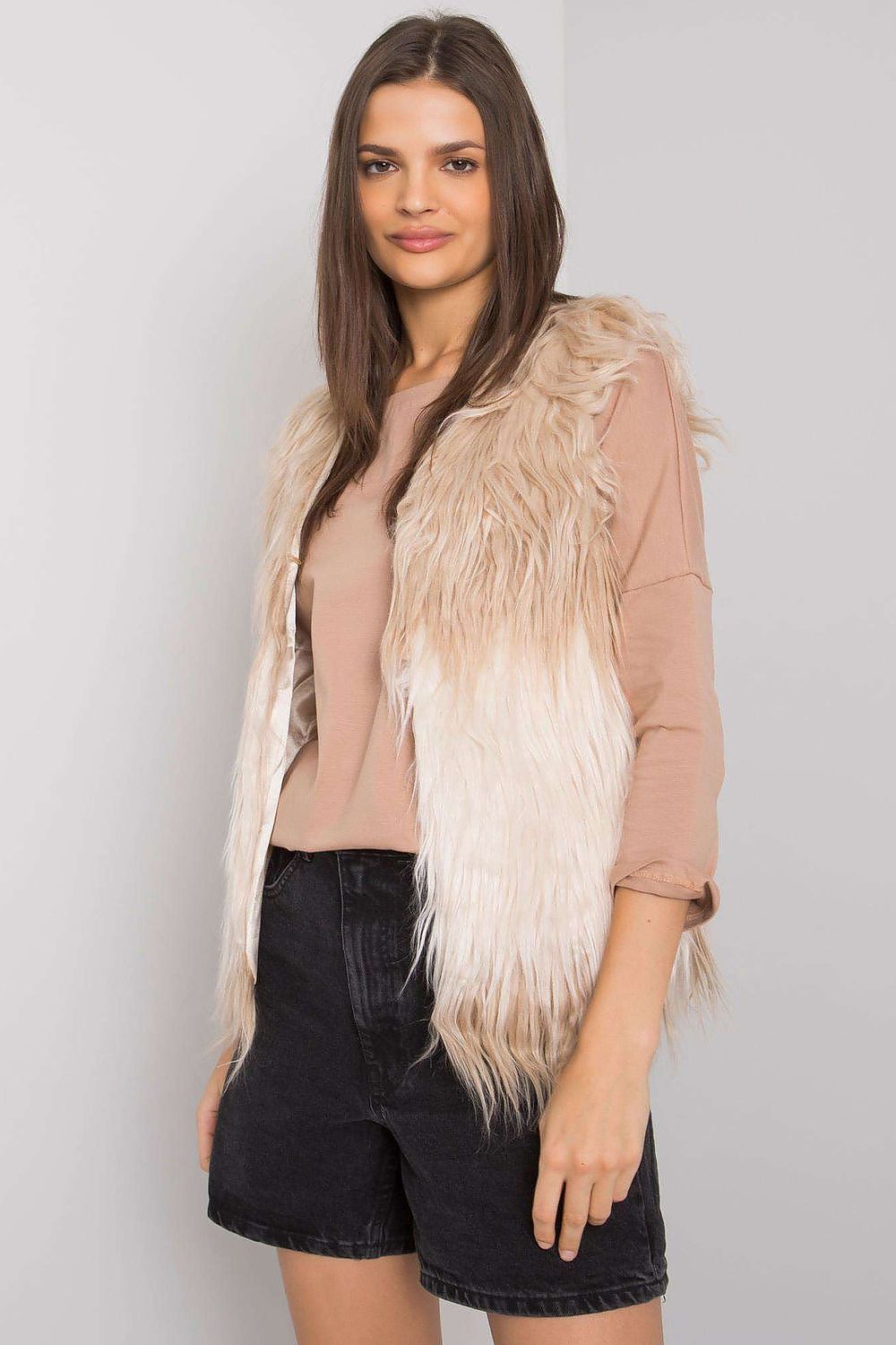 Luxury Yups fur vest gilet featuring a stylish hook-and-eye fastening, available in sizes S to XL, elegantly crafted for sophisticated layering.