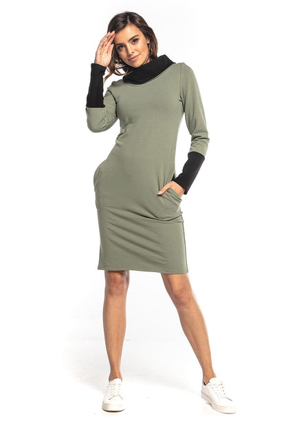 Elegant fitted Tessita daydress in soft sweatshirt knit, featuring a stylish turtleneck and contrasting sleeves, perfect for an everyday luxurious look.
