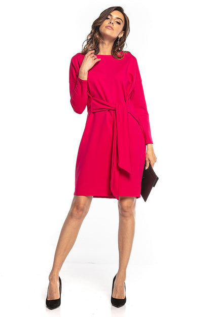 Elegant pink midi dress by Tessita featuring a kimono style design, tie belt, and long sleeves, perfect for chic evening outings.