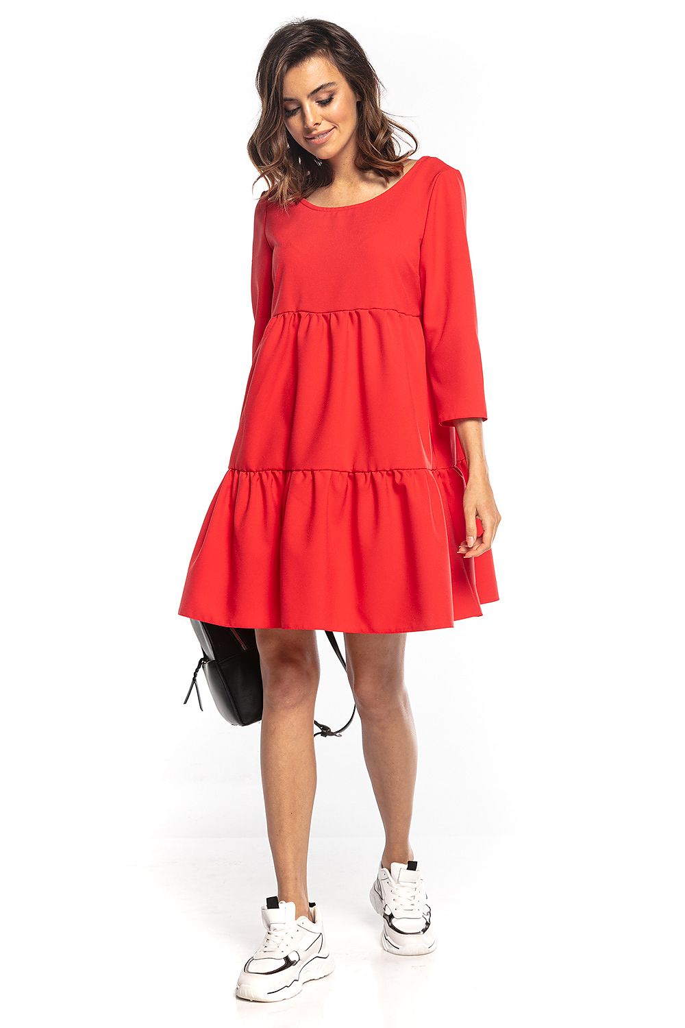Graceful red mini dress by Tessita, showcasing a flared cut and stylish 3/4 sleeves. The deep back neckline adds allure, perfect for a refined look.