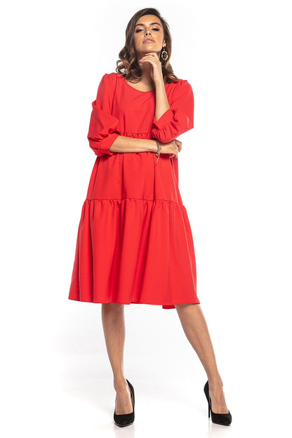 Stylish red bouffant sleeve day dress with ruffles and flared cut, perfect for daytime elegance, by Tessita.