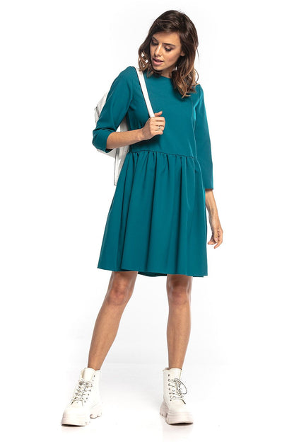 Stylish Elegant Midi Dress with 3/4 sleeves by Tessita, featuring a pleated waist and a slightly flared skirt, perfect for sophisticated occasions.