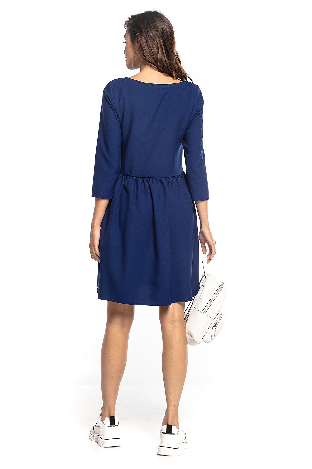 Back view of an elegant navy blue midi dress featuring 3/4 sleeves and pleated waist, by Tessita.
