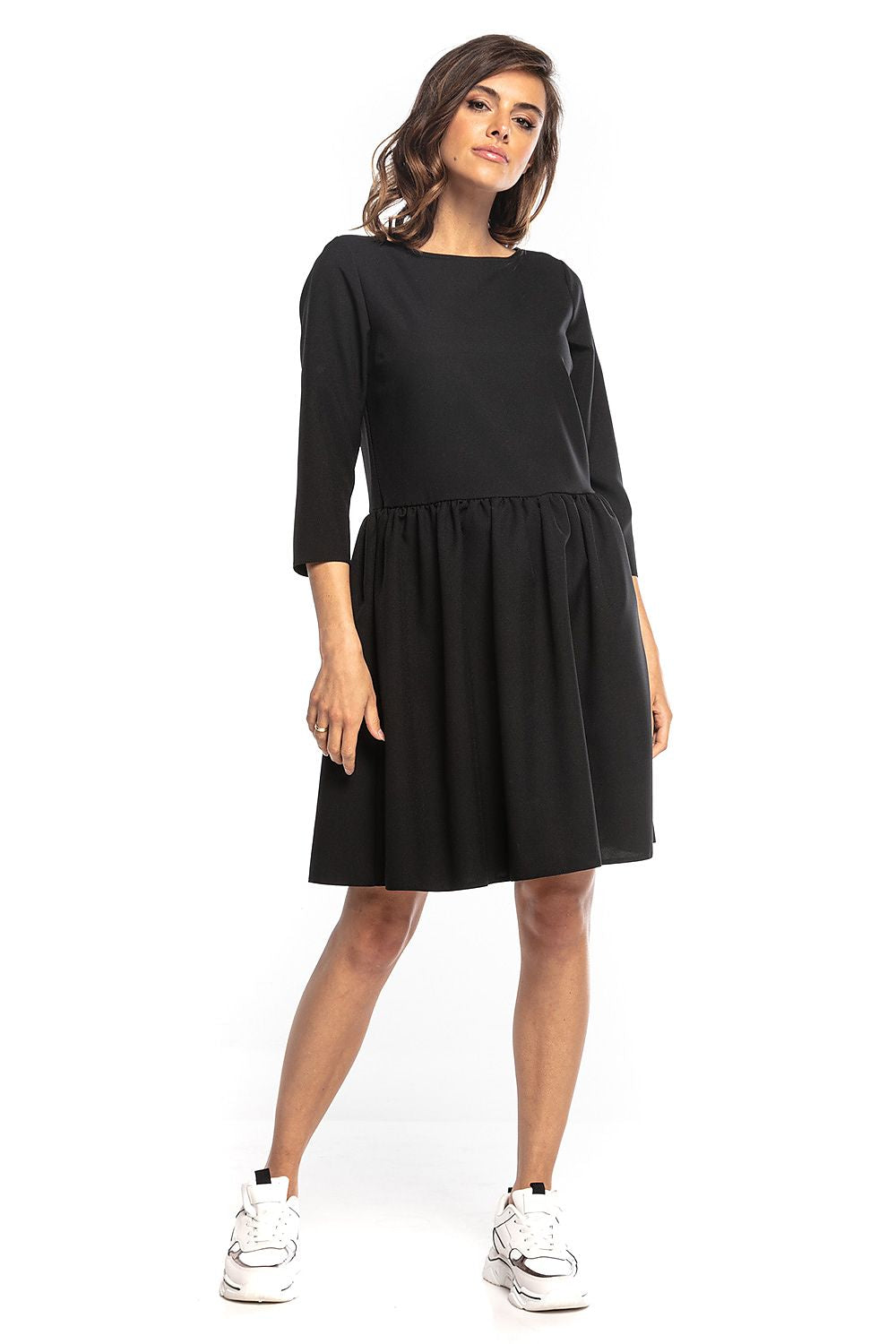 Elegant black midi dress from Tessita, showcasing 3/4 sleeves and a fitted bodice with waist pleats, perfect for luxurious occasions.