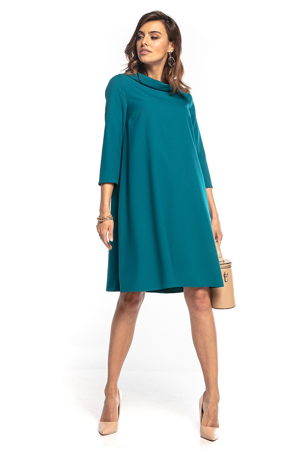 Chic Tessita midi dress featuring elegant 3/4 sleeves and a sophisticated folded collar, styled in a vibrant teal. Exudes Jackie Kennedy flair, perfect for classy occasions.