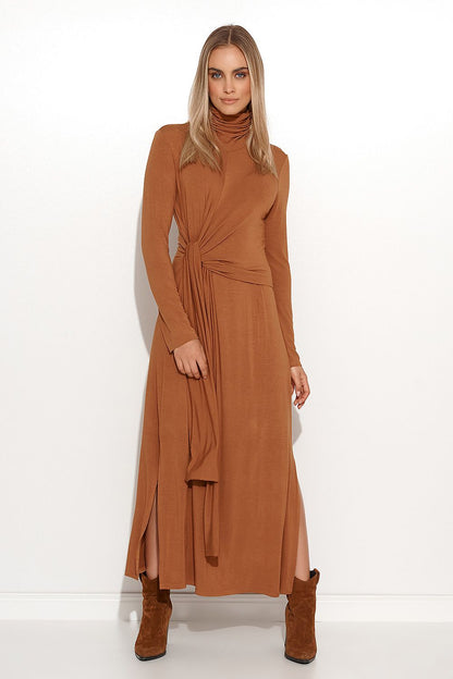 Elegant Makadamia Long Turtleneck Daydress in lightweight viscose knit with asymmetrical tie, styled for sophistication.