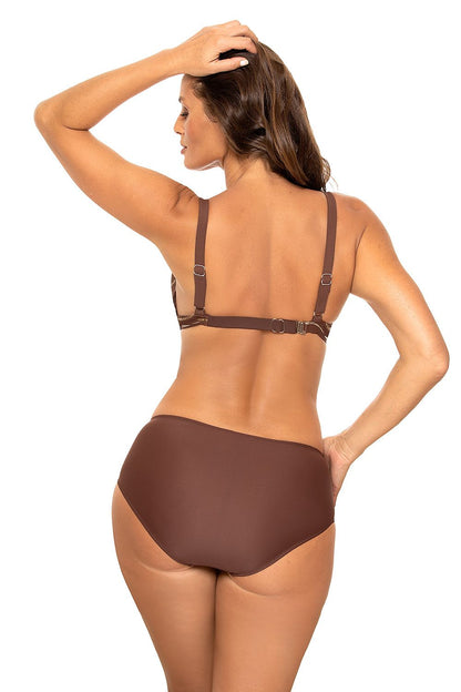 Back view of a fashionable two-piece swimsuit highlighting adjustable straps and luxurious Italian fabric, as the woman poses elegantly on a beach.